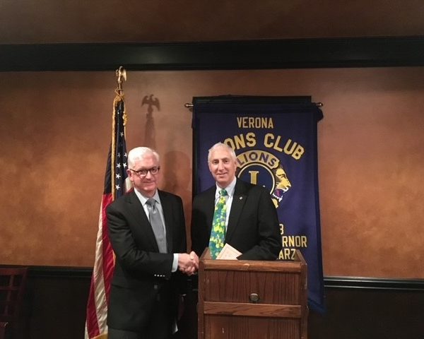 Verona BSA Committee Chairman Rich Sinton receives a donation for the purchase of troop equipment from VLC past President Steve Janett